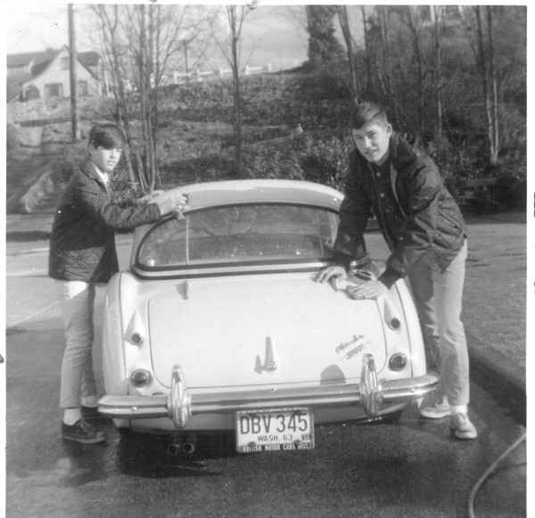 Allan & Mark Seidenverg washing Allan's 1960 Austin Healey in front of the family house at 1815 E. Calhoun St.  - November 1964